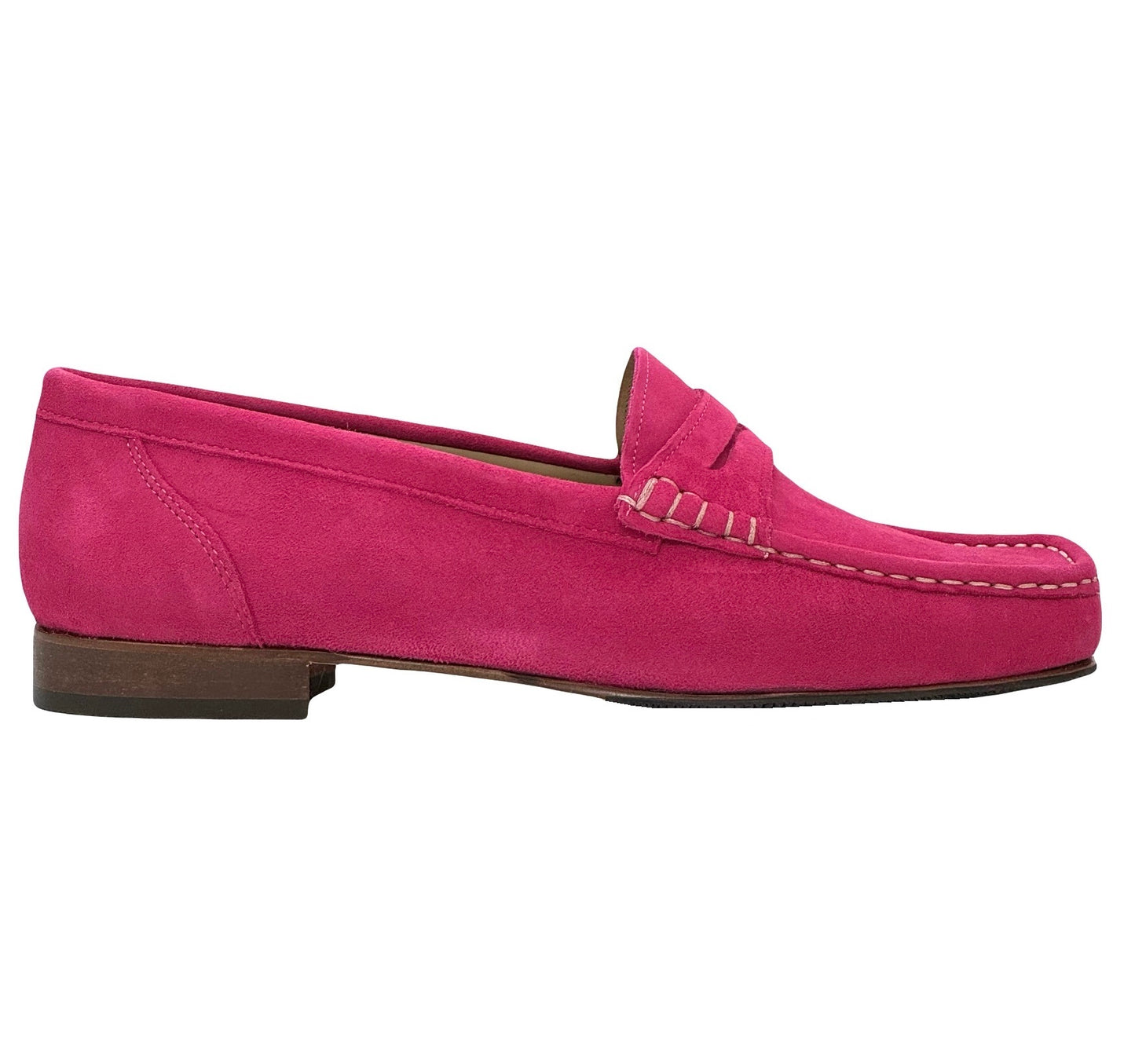 A pink suede moccasin loafers for women with a closed toe and flat heel.